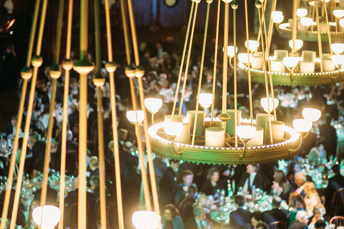 Harvardwood - Image of chandeliers at a celebratory dinner